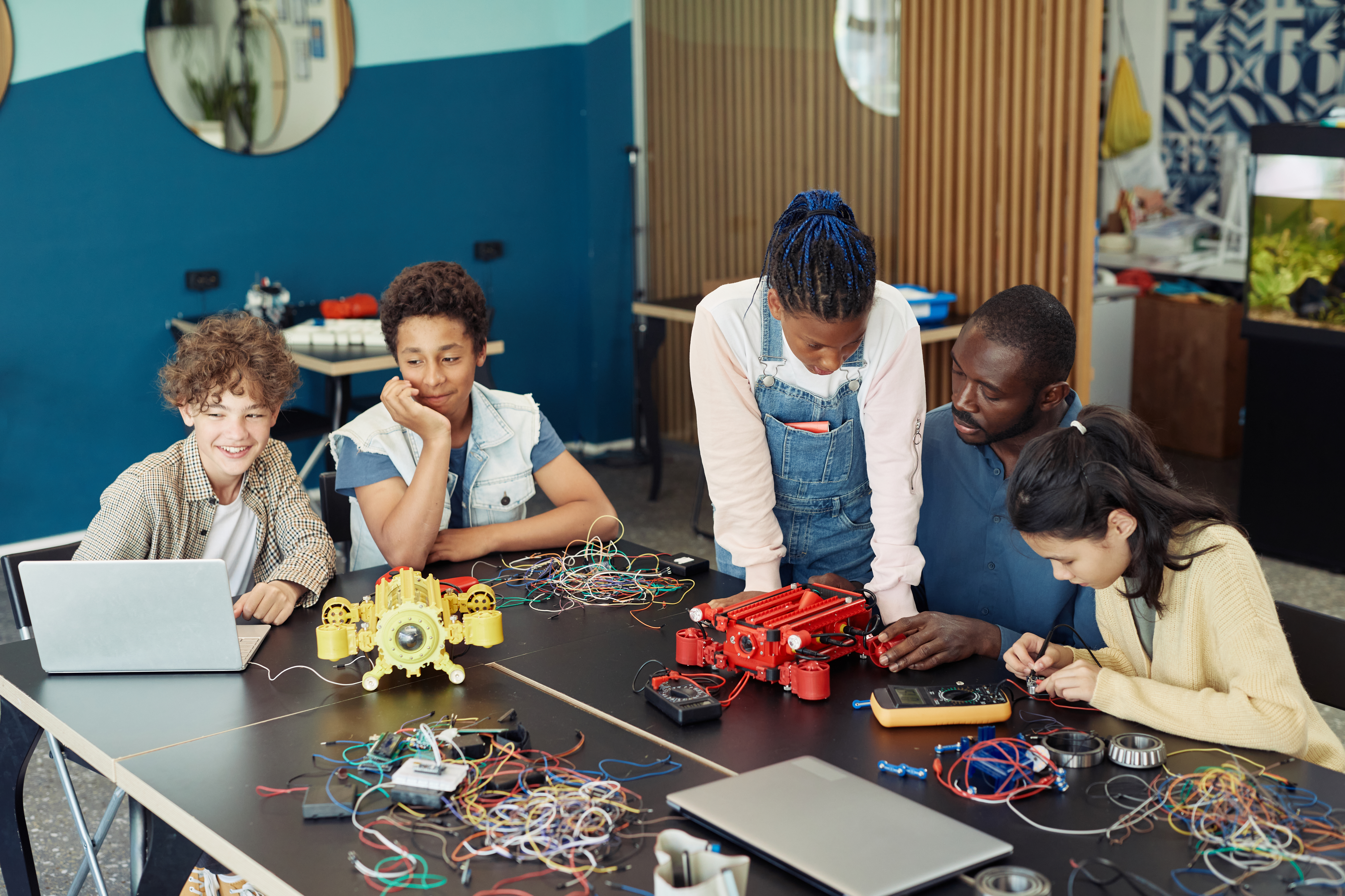 Children collaborating on a robotics project in class